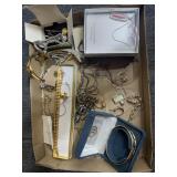 Flat of costume jewelry