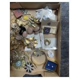 Flat of costume jewelry