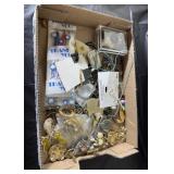 Flat of costume jewelry