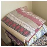group of comforters and blankets
