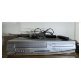 VCR/DVD, Roku w/ remote, assorted cords