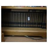 bottom shelf of books