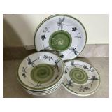 1 dinner plate, 2 appetizer plates. 4 salad bowls