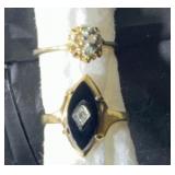Pair of rings marked 18k hge