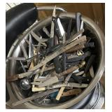 Aluminum pan full of flatware mostly various