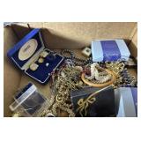 Flat of costume jewelry