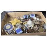 Flat of costume jewelry
