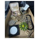 Flat of costume jewelry