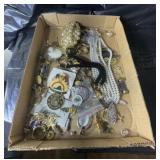 Flat of costume jewelry