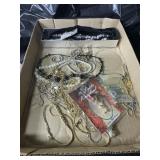 Flat of costume jewelry