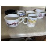 Group of cups including Red River