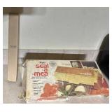 Seal a meal and meat thermometer