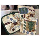 Towel and pair of oven mits