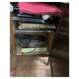 contents of cabinet including picture frames