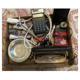 misc box lot including calculators, power adapters