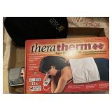heating pad in box, writst BP, and tens unit