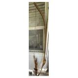 wooden long bow and arrows