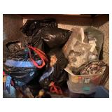 Contents of shelf, Christmas garland, toys etc