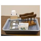 Napkin holder cup holder and a brownie pan