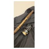 Mitchell open face reel on 6.5 foot Berkley pole