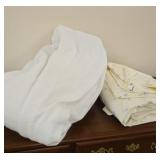 Queen size sheets and a mattress protector
