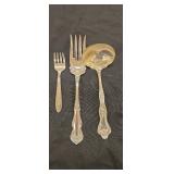 One Silver-plated fork and 2 unmarked serving
