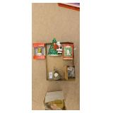 Box of christmas ornaments and a clock