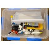 Big tote of cleaning supplies and chemicals