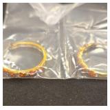 Gold Tone hoop earrings with pink flowers from