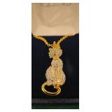 The fanberry mint in gold tone and rynestones