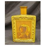 Boy holding a flute empty decanter