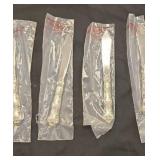 4 knives in original bags never used  by Gorham