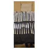 Dinner Knives with sterling silver handles. 24