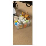 Tote of cleaning supplies
