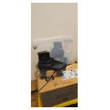 Tote and contents of roller skates approx size
