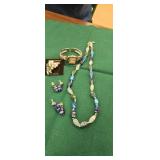 Ladies watch necklace, earrings and broach