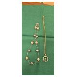 Pair of costume necklaces