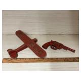 Red Toy Plane and Gun