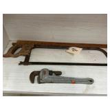 Hacksaw and Pipe Wrench