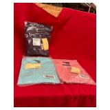Three Packaged Shirts