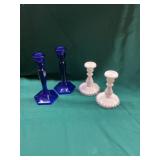 Four Glass Candlesticks
