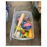 Plastic Bin With Sports Equipment