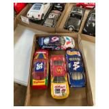 Four Diecast Cars