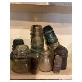 8 insulators, glass, plastic, etc