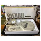 Suzuki omnichord, model OM 300, battery operated
