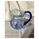 Glass pitcher w/blue swirls, 7"