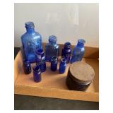 10 blue glass bottles, noxzema shave, Chas. H.