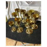 9 Brass candlestick holders, tallest is 8.5"