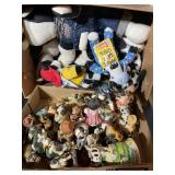 Ceramic and stuffed cow lot