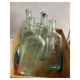 7 Misc green tint glass bottles, 8.5"
